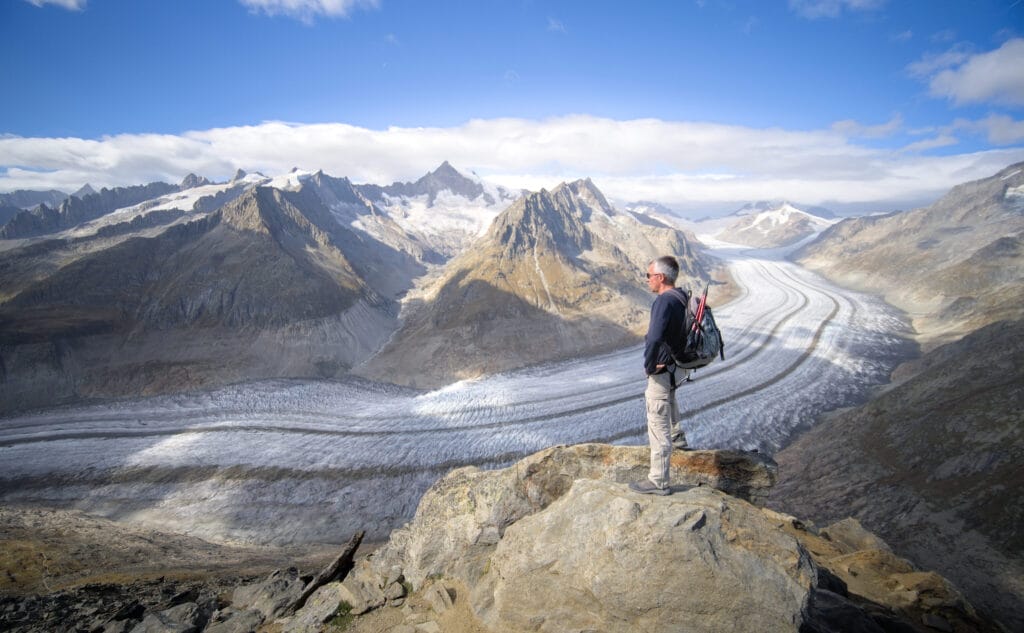 Clément overlooking the Aletsch glacier at the top of Eggishorn